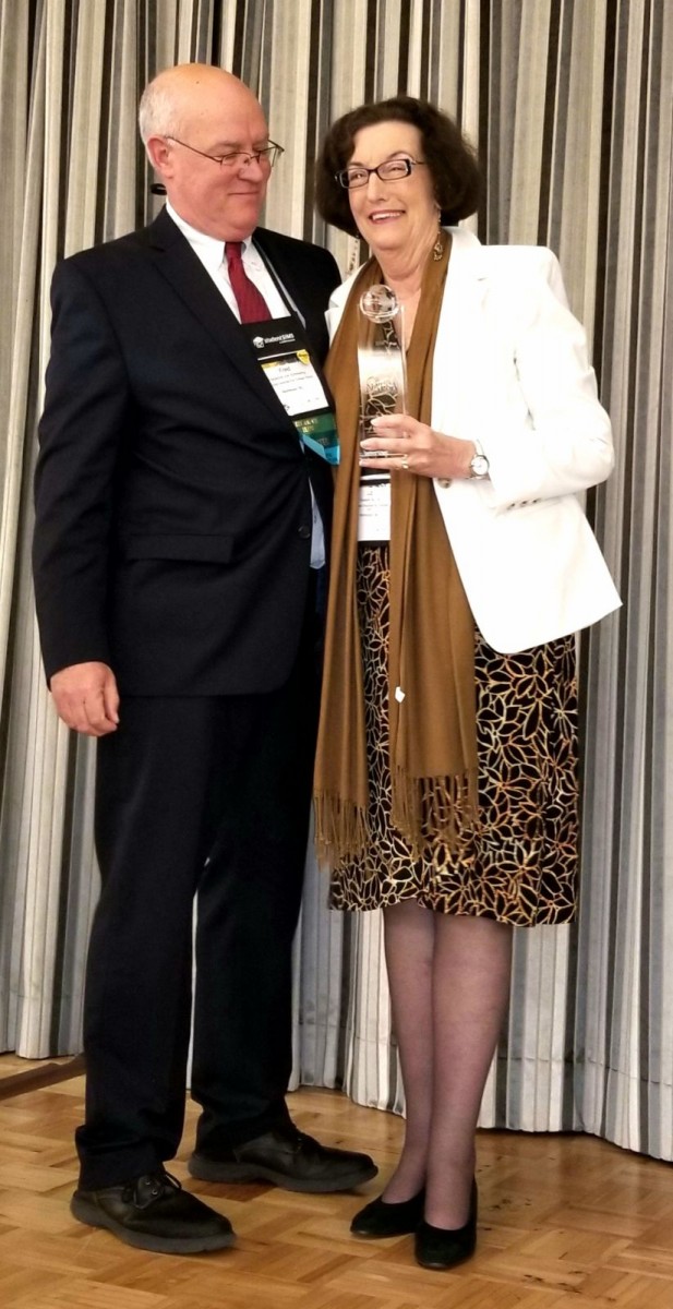 API employee Elizabeth Adams receiving NAFSA Region VII International Excellence Award